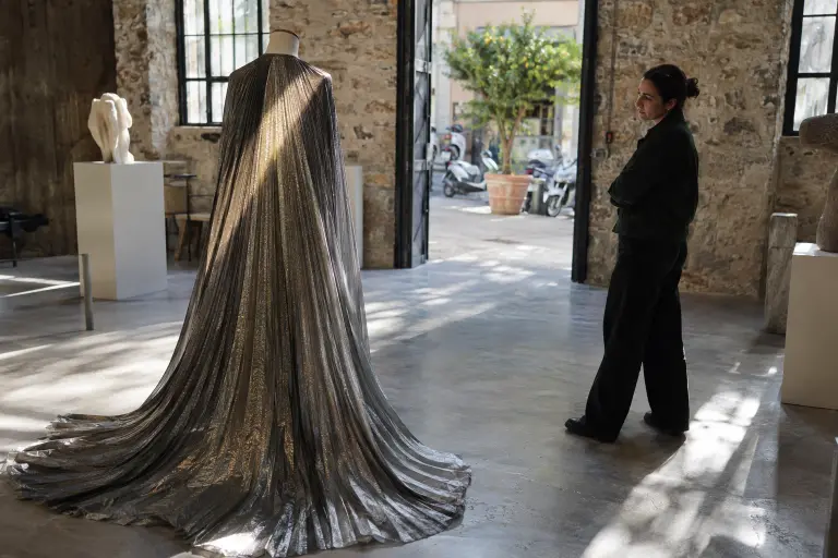 The pleated, light-catching cloak at the Aegean House of Form in Athens, part of an exhibition inspired by research into ancient Greek wool.