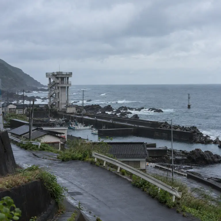 A coastal evacuation tower and wave-gauge mast overlook the Pacific near Cape Muroto, one of the areas included in the network’s tsunami scenarios.