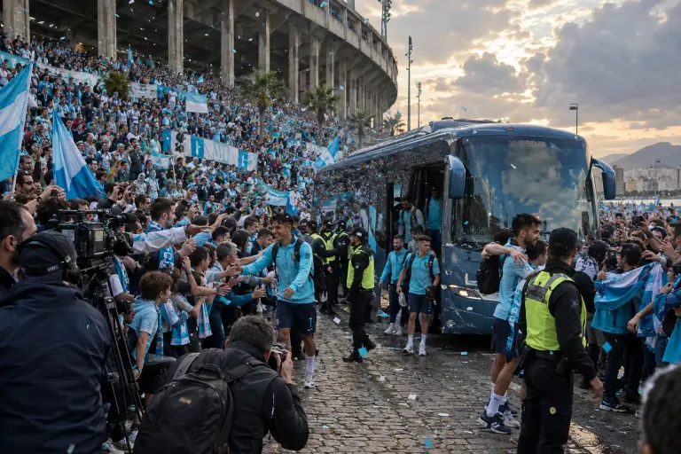 Fans and players celebrate outside Estadio San Lorenzo in Cartagena after Tuesday’s court ruling restored Deportivo Atlántico’s promotion.